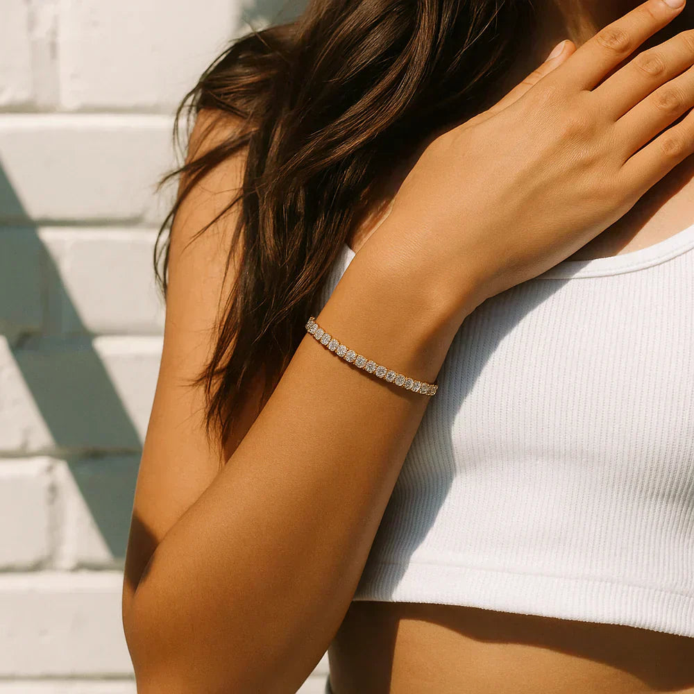 Gold tennis bracelet with moissanite