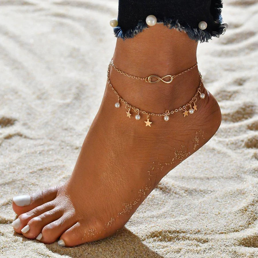 Anklet with infinity motif + pearls and stars | White gold