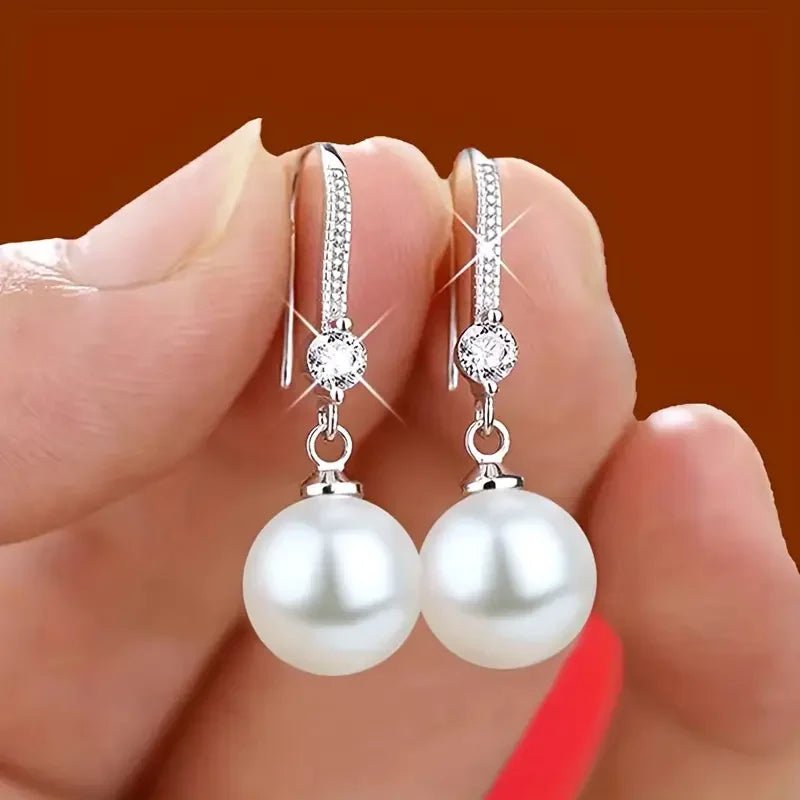 Earrings with shiny zirconia beads | White gold