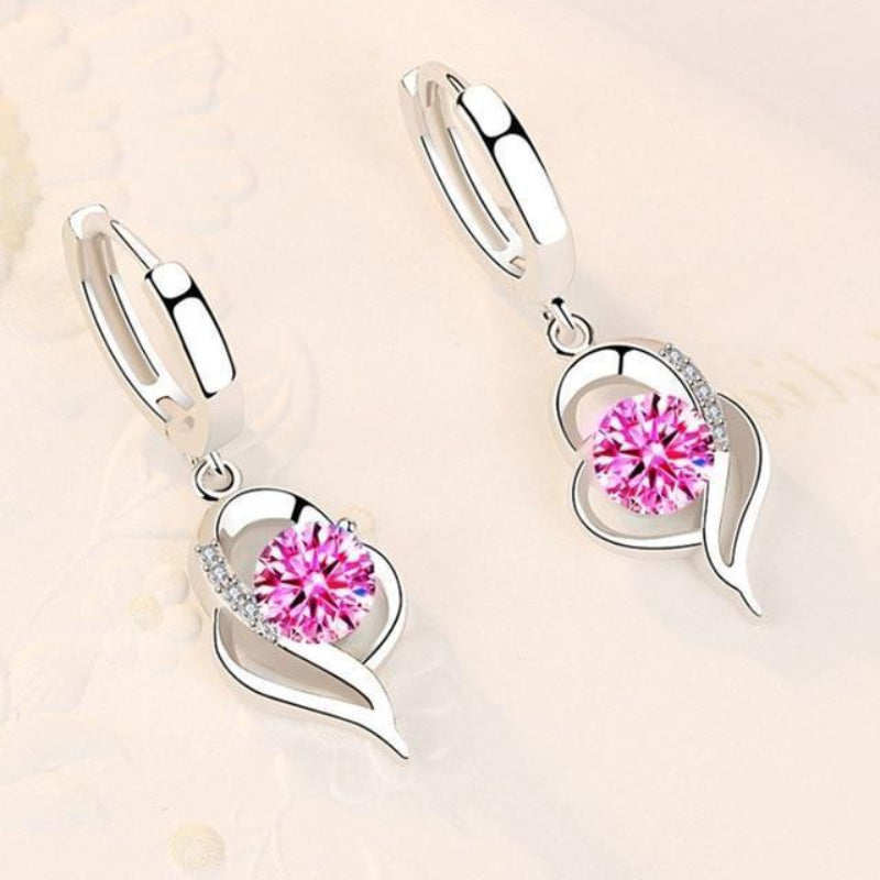Silver earrings with inlaid zirconia flowers | White gold