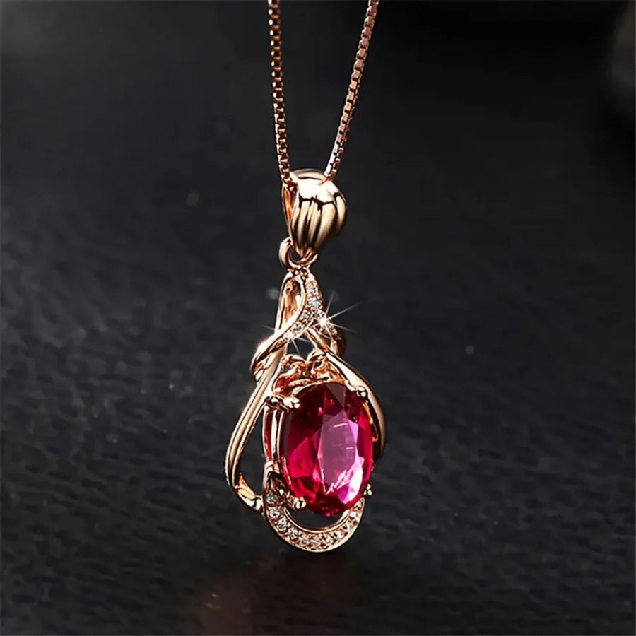 Beautiful necklace with red crystals and gold accents | Gold