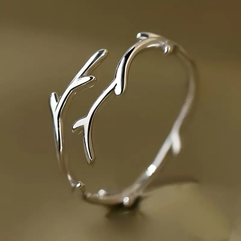 Ring with moonlit branch | White gold