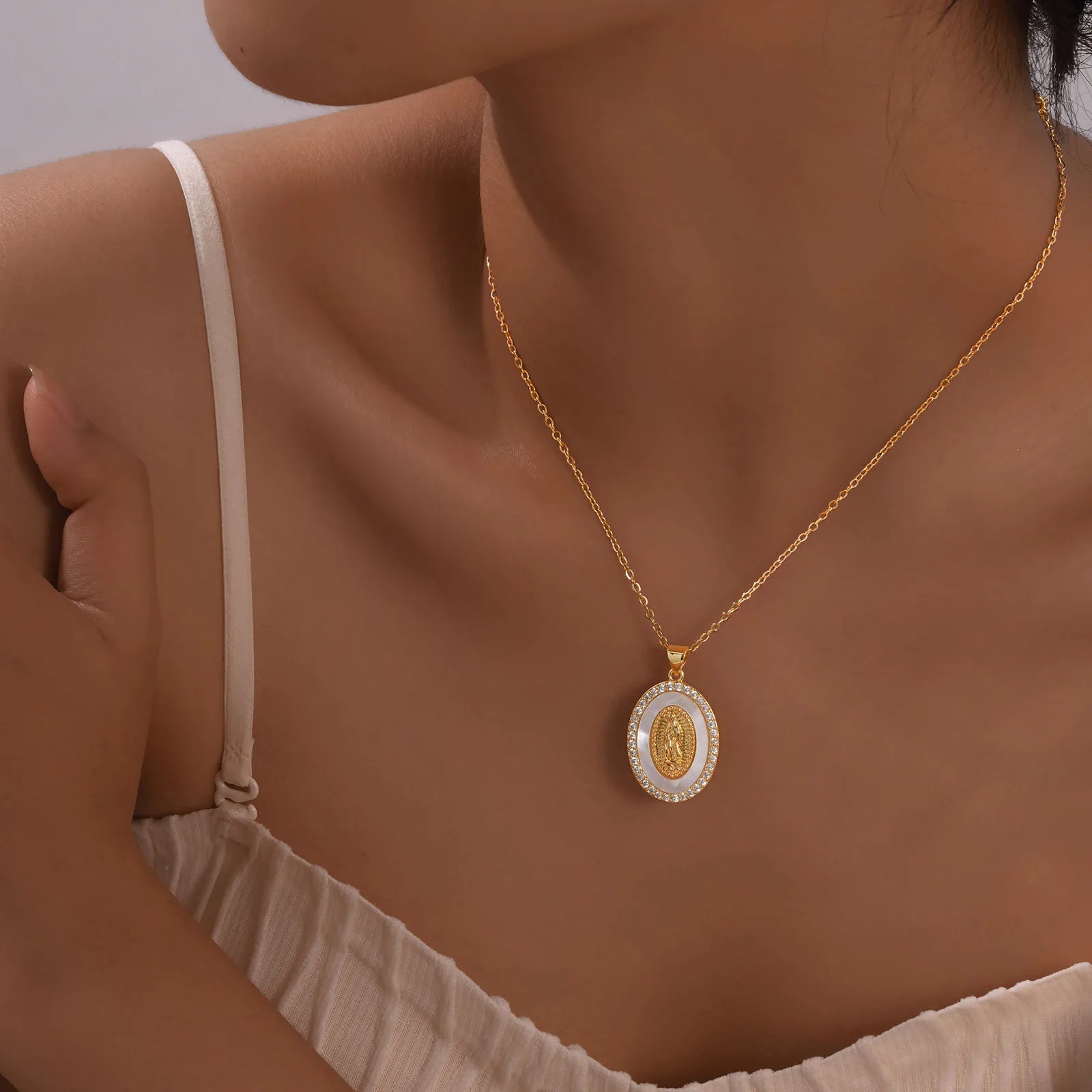 Necklace with Oval Virgin Pendant in Gold