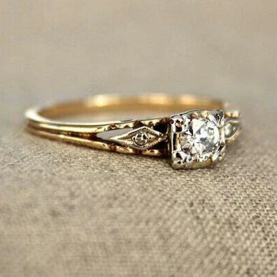 Vintage ring made of fine gold with zircon