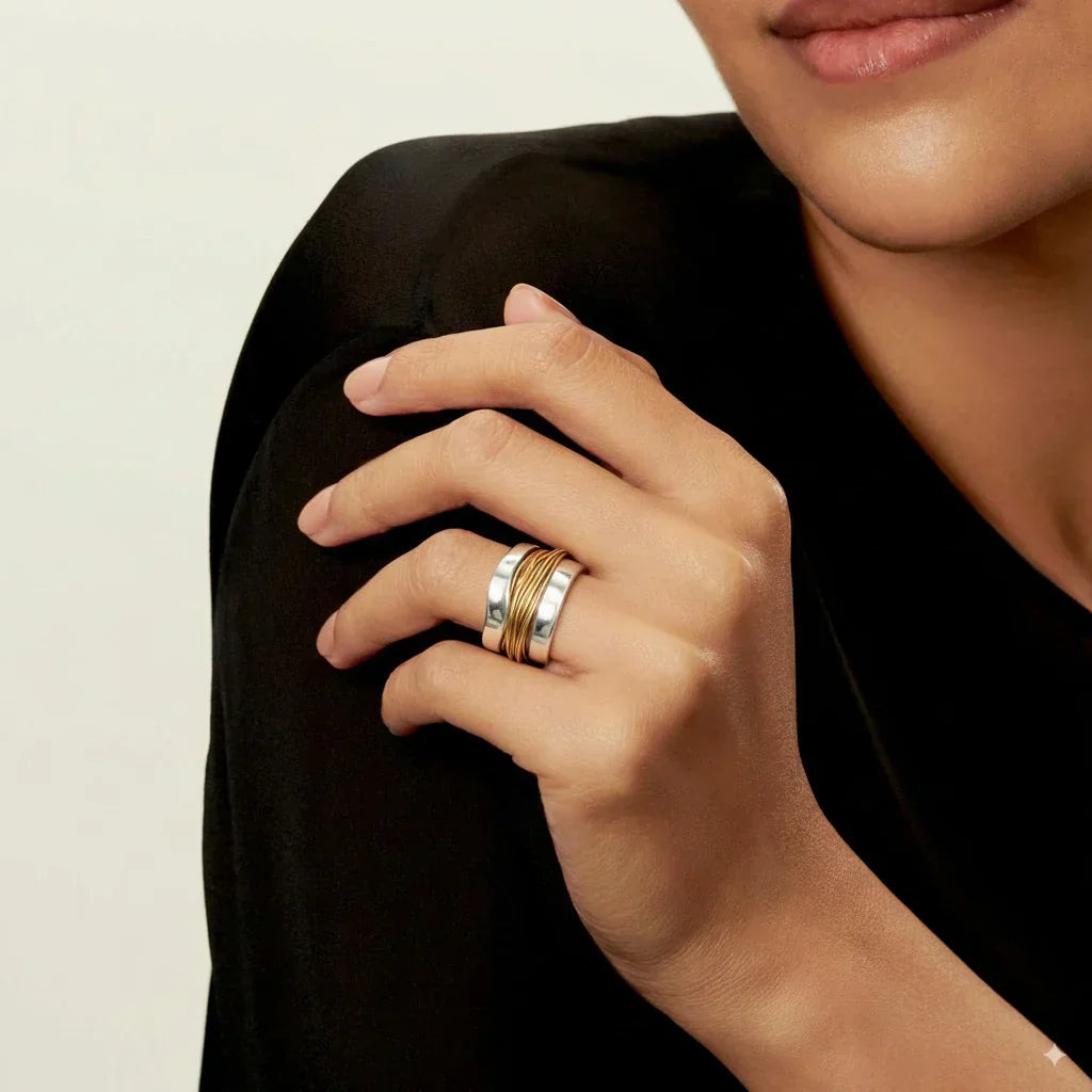 Silver ring with gold thread